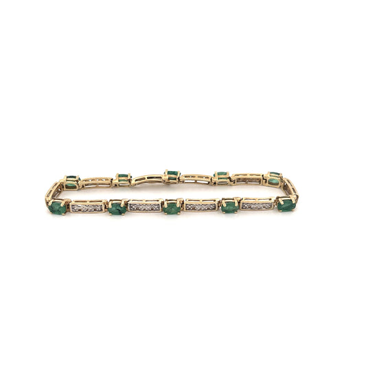 10K Yellow Gold Oval Emerald 1.5ct and Diamond 0.05ct Tennis Bracelet