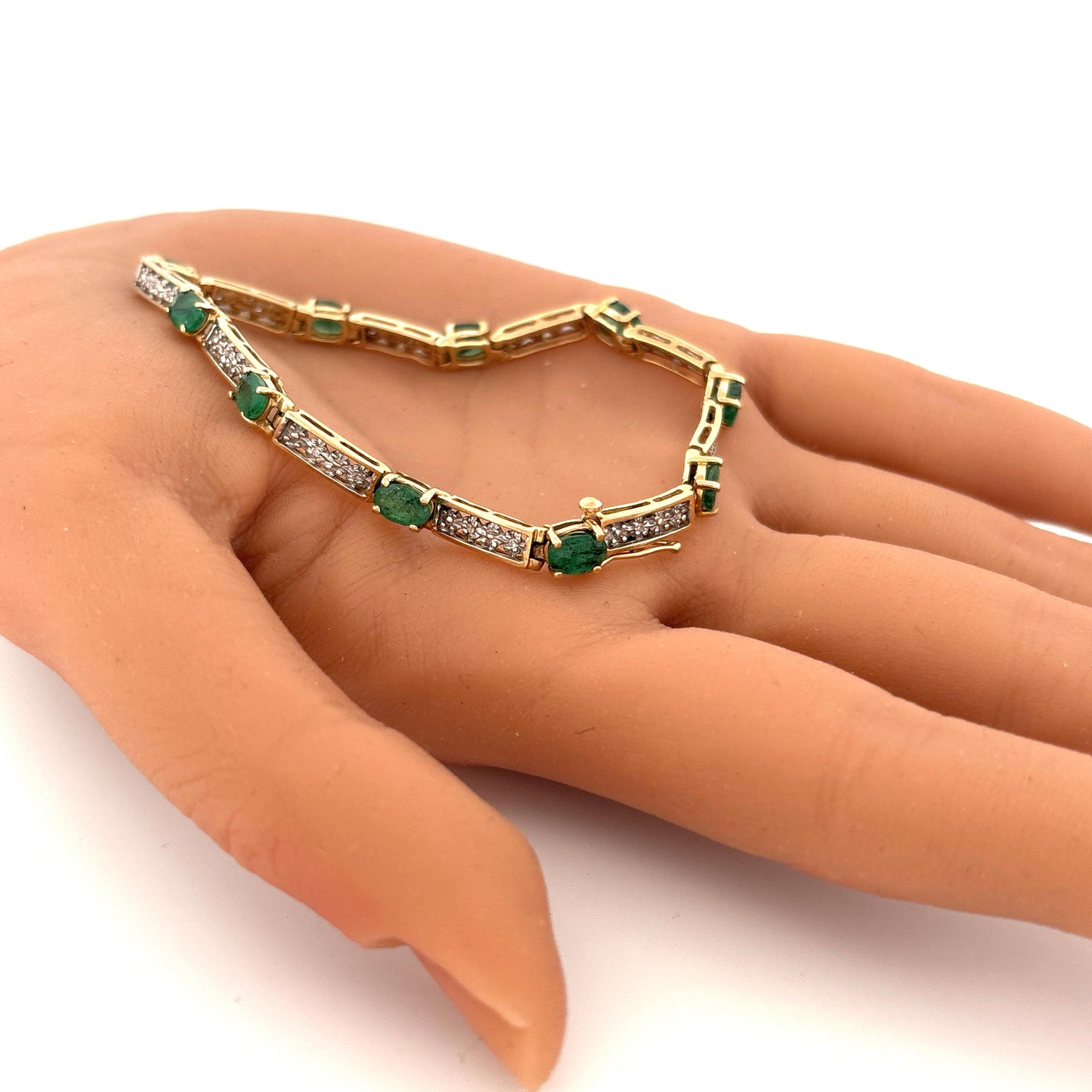 10K Yellow Gold Oval Emerald 1.5ct and Diamond 0.05ct Tennis Bracelet