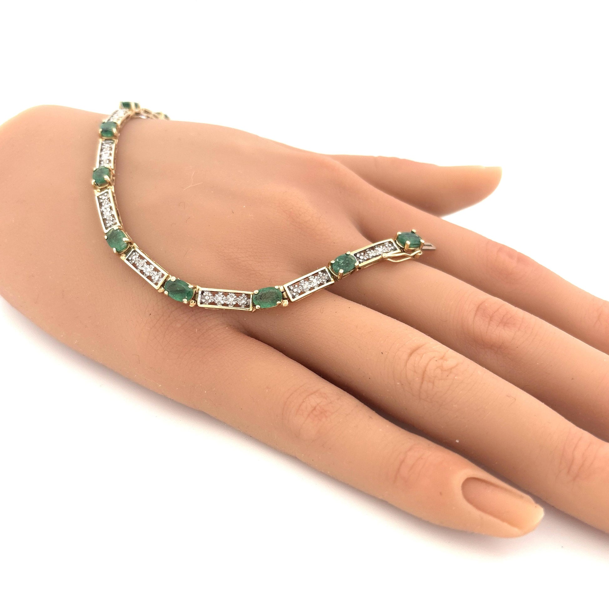 10K Yellow Gold Oval Emerald 1.5ct and Diamond 0.05ct Tennis Bracelet