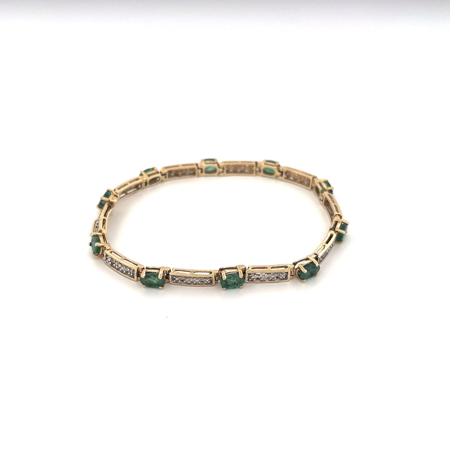 10K Yellow Gold Oval Emerald 1.5ct and Diamond 0.05ct Tennis Bracelet
