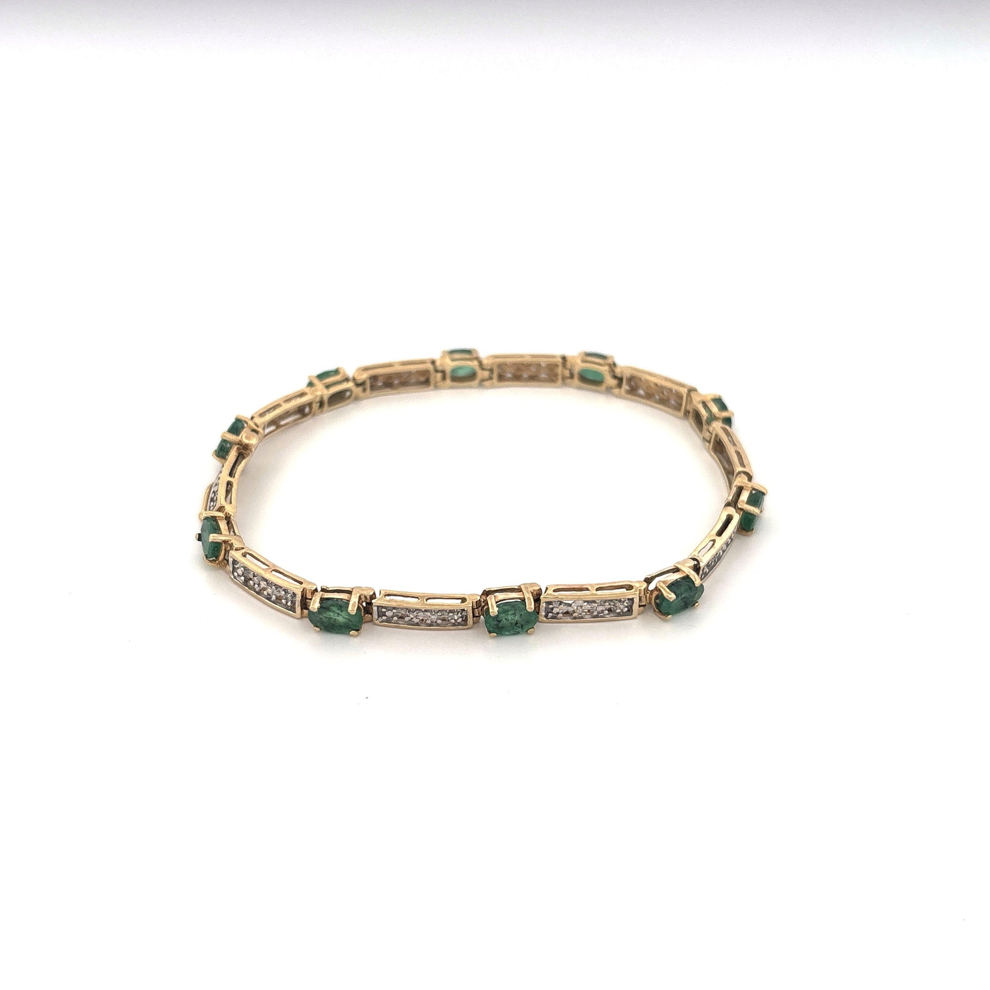 10K Yellow Gold Oval Emerald 1.5ct and Diamond 0.05ct Tennis Bracelet