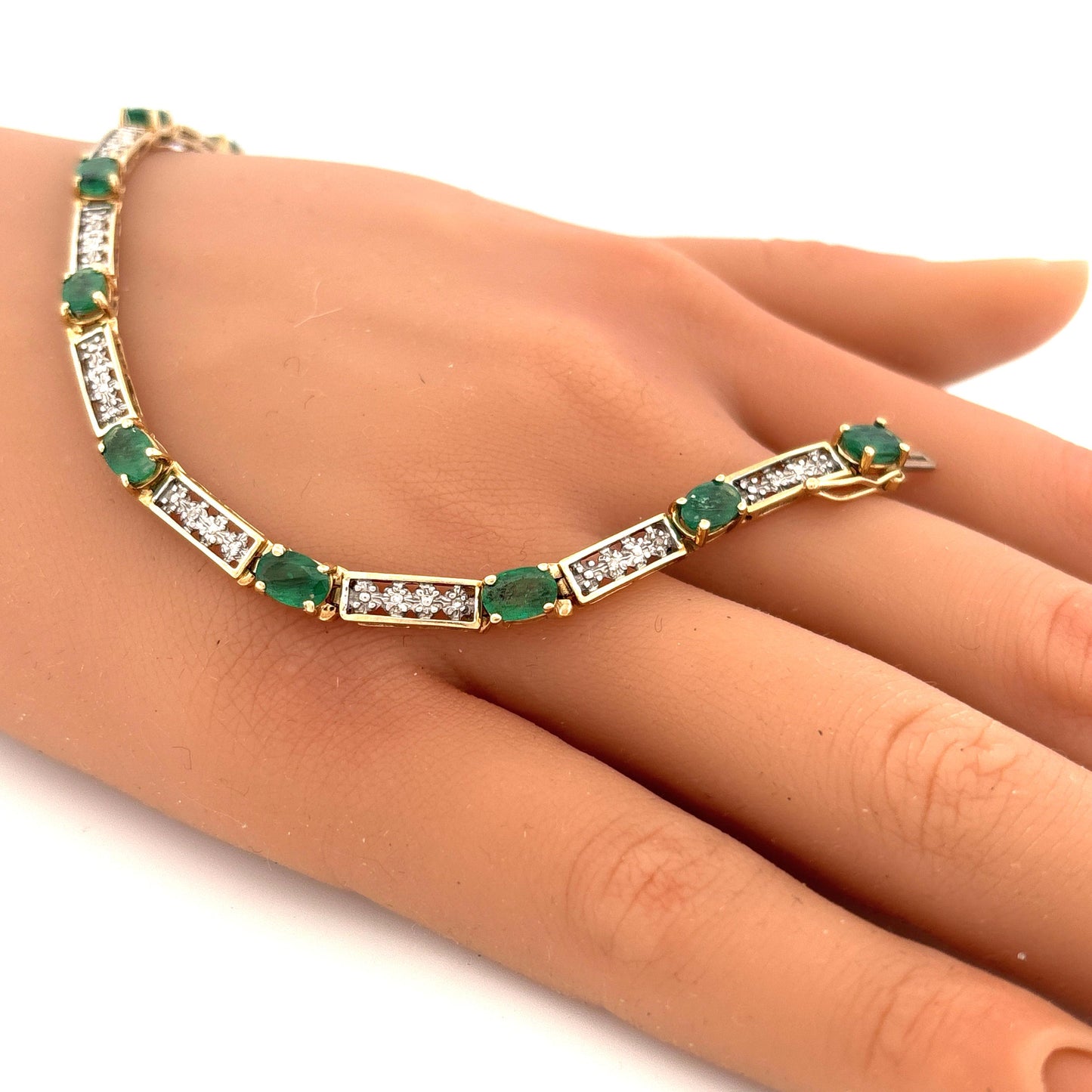 10K Yellow Gold Oval Emerald 1.5ct and Diamond 0.05ct Tennis Bracelet