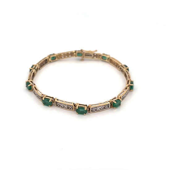10K Yellow Gold Oval Emerald 1.5ct and Diamond 0.05ct Tennis Bracelet