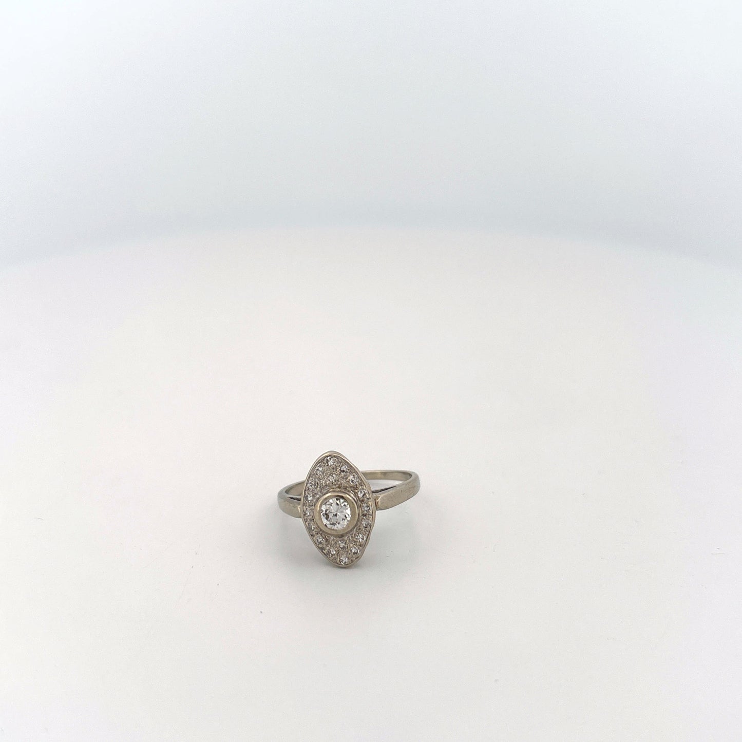 14K White Gold Ring with Round Diamond and oval setting